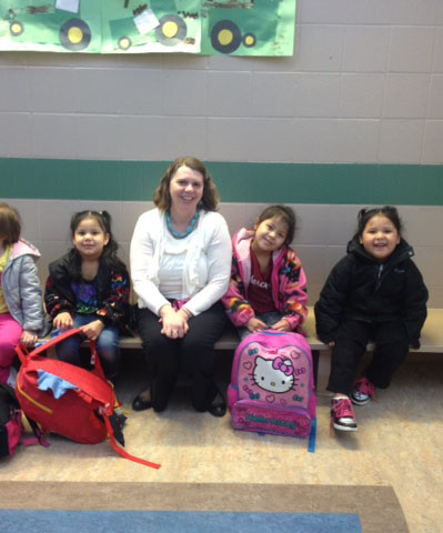 photo of Tammy Wicksrom in a classromm with children