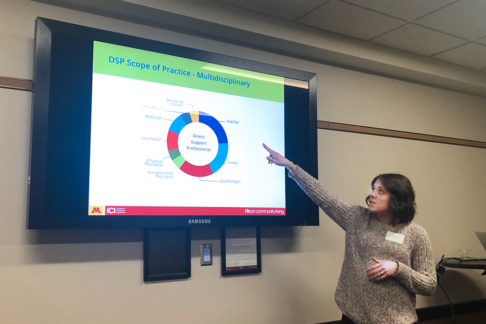 ICI’s Julie Kramme pointing at a screen.