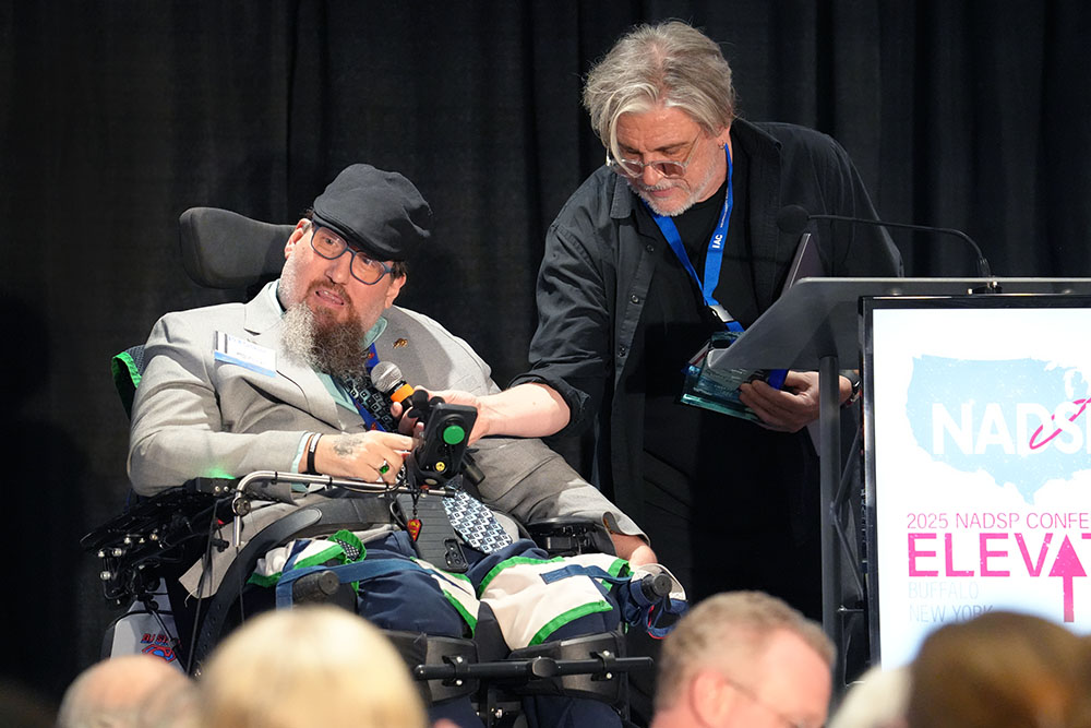 BJ Stasio (left) received the 2025 Dave Hingsburger Humanitarian Award from John Raffaele (right), NADSP's Director of Educational Services, during NADSP's ELEVATE Conference in Buffalo, New York, in September 2025.
