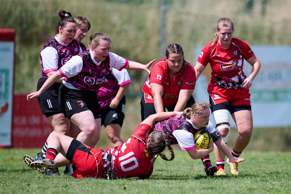 two rugby teams clash on the field