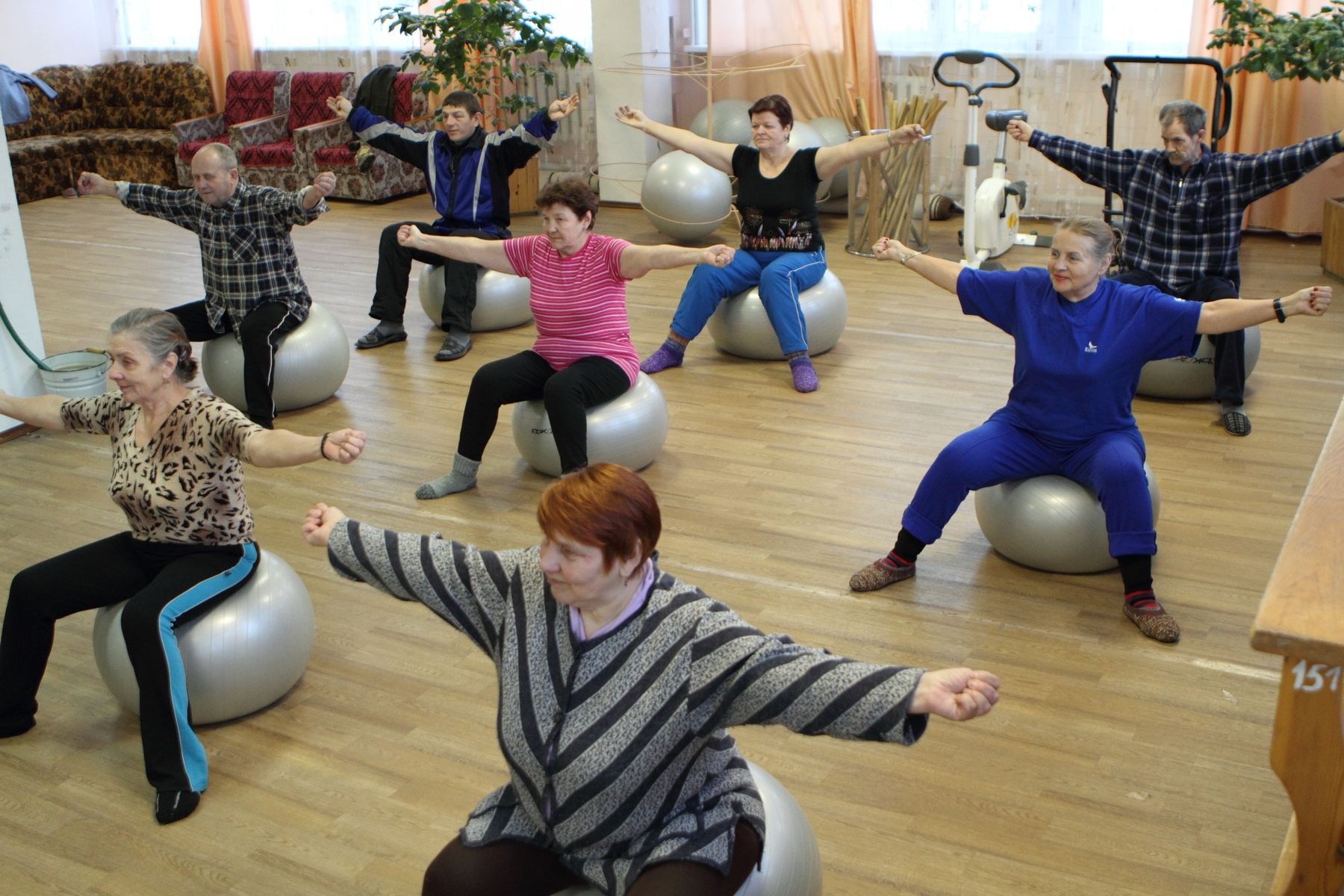 a group of older adults in an exercise class.